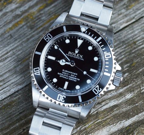 Rolex submariner 14060m price